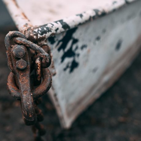 A closeup shot of an old rusted boat